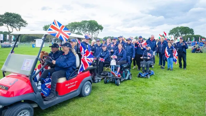The British para driving squad parading with Union Flags at the 2025 World Championships, Amanda among them